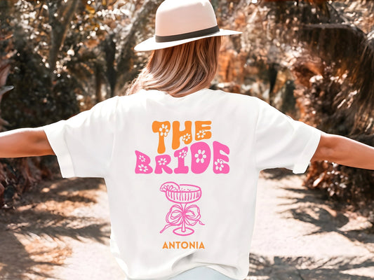 JGA T-Shirt in Retro Stil Personalisiert mit Blumen - Braut Crew Shop